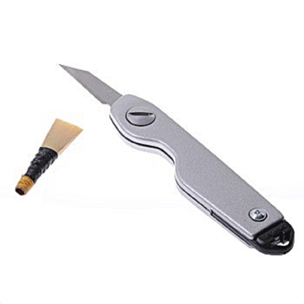 Knife for reed manipulation